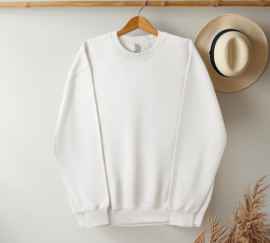 Unisex crewneck sweatshirt hanging neatly on a wooden hanger against a neutral background, showcasing its soft fabric and classic design.