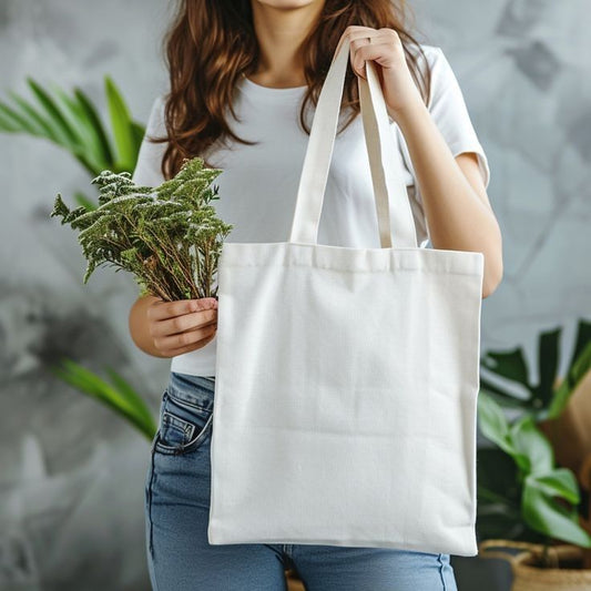 Woman holding a cotton canvas tote bag while shopping sustainably